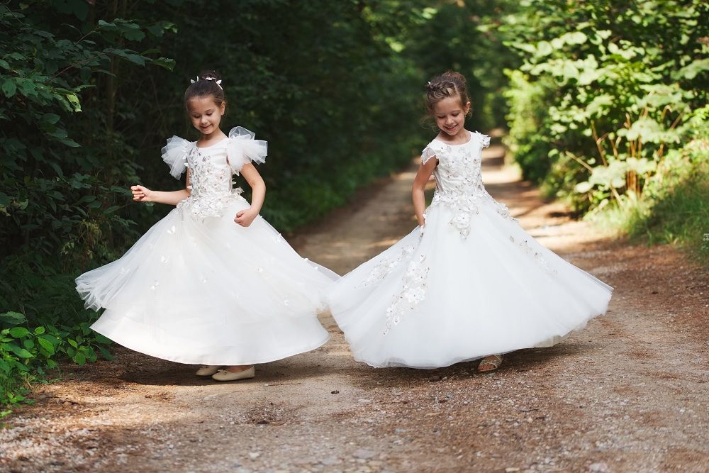 happy-beautiful-girls-with-white-wedding-dresses-CKU8P25.jpg