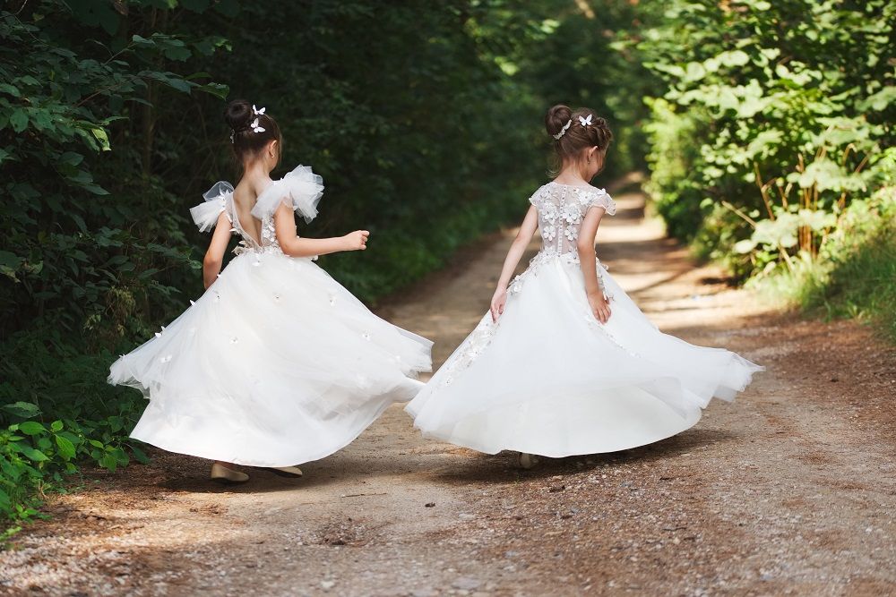 happy-beautiful-girls-with-white-wedding-dresses-7ED2NRB.jpg