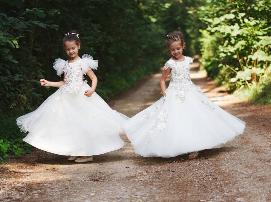 happy-beautiful-girls-with-white-wedding-dresses-CKU8P25.jpg