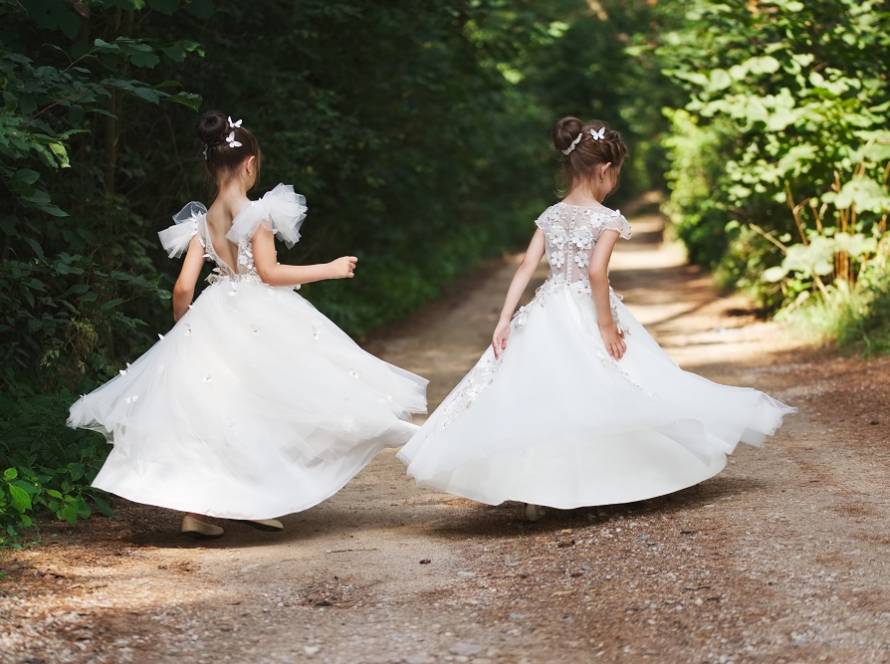 happy-beautiful-girls-with-white-wedding-dresses-7ED2NRB.jpg